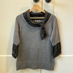 RW&Co. Retro grey sweater with faux black blouse with tie.